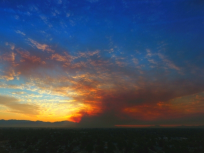 Smoke fills the sky with haze and covers The San Fernando Valley Sunrise